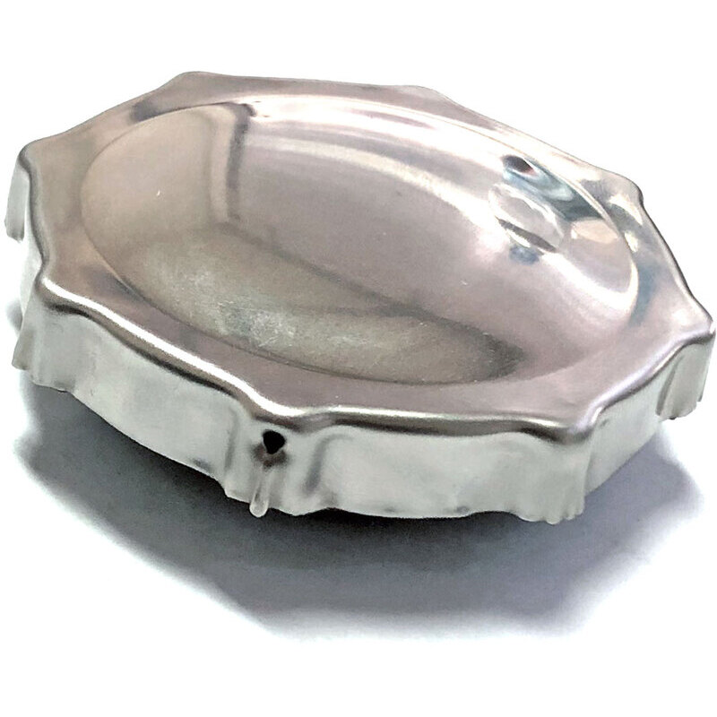 Fuel cap snap fixing British
